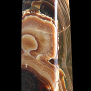 Chocolate Calcite obelisk 118*33*28mm 236g in sunlight - Rocks and Things Store