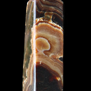 Chocolate Calcite obelisk 118*33*28mm 236g in sunlight - Rocks and Things Store