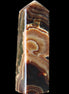 Chocolate Calcite obelisk 118*33*28mm 236g in sunlight - Rocks and Things Store