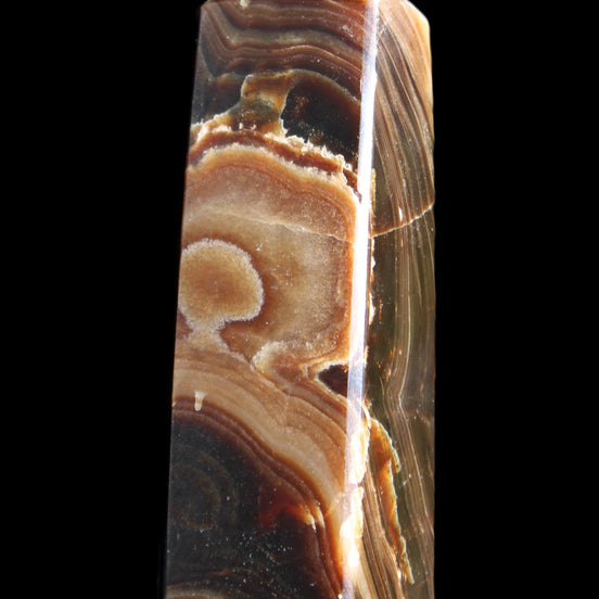 Chocolate Calcite obelisk 118*33*28mm 236g in sunlight - Rocks and Things Store