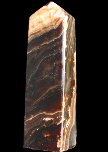Chocolate Calcite obelisk 118*33*28mm 236g in sunlight - Rocks and Things Store