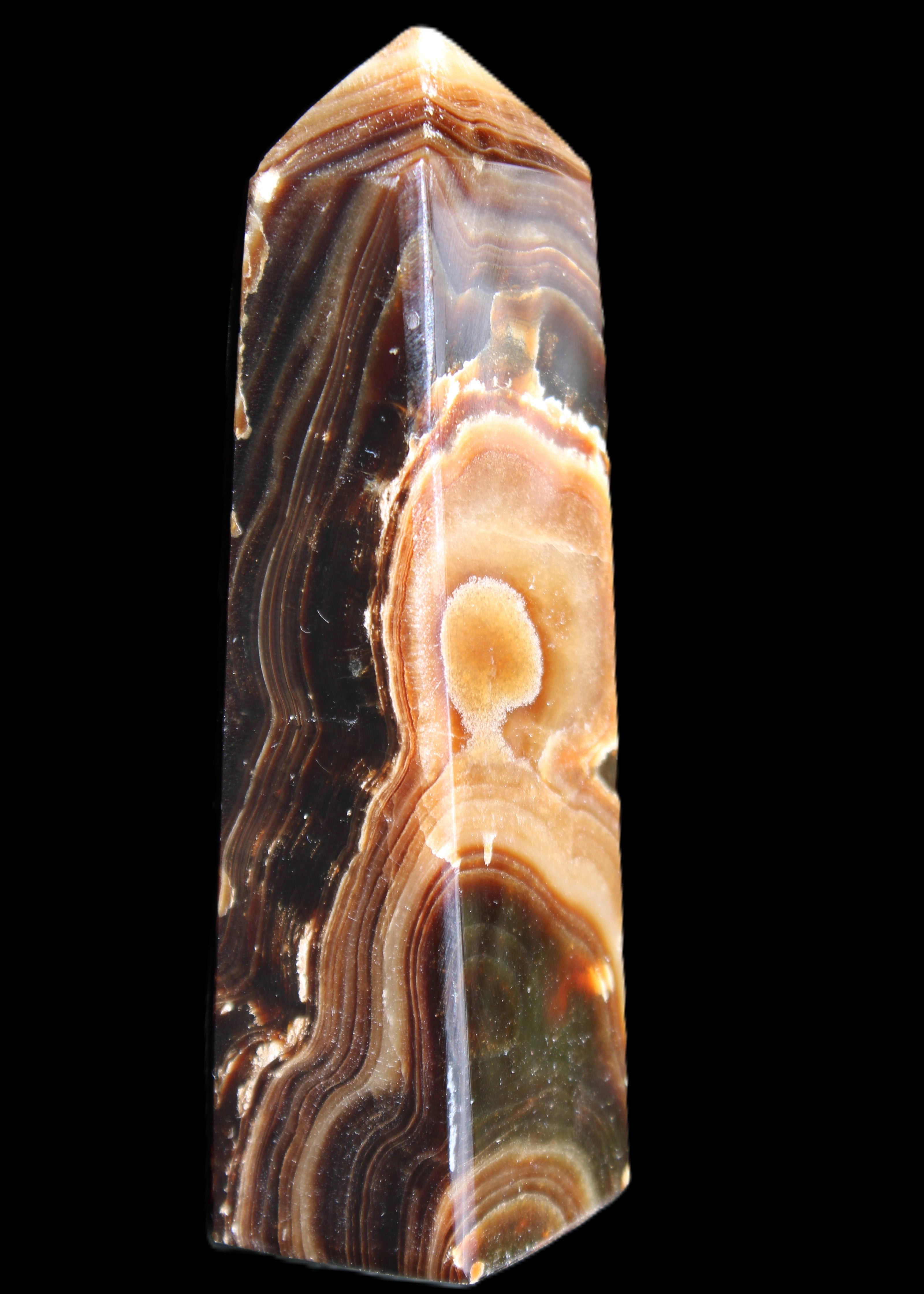 Chocolate Calcite obelisk 118*33*28mm 236g in sunlight - Rocks and Things Store