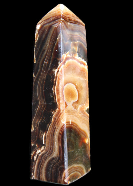 Chocolate Calcite obelisk 118*33*28mm 236g in sunlight - Rocks and Things Store