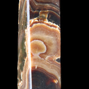 Chocolate Calcite obelisk 118*33*28mm 236g in sunlight - Rocks and Things Store