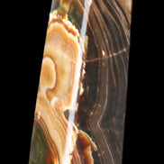 Chocolate Calcite obelisk 118*33*28mm 236g in sunlight - Rocks and Things Store