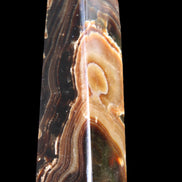Chocolate Calcite obelisk 118*33*28mm 236g in sunlight - Rocks and Things Store