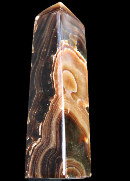 Chocolate Calcite obelisk 118*33*28mm 236g in sunlight - Rocks and Things Store