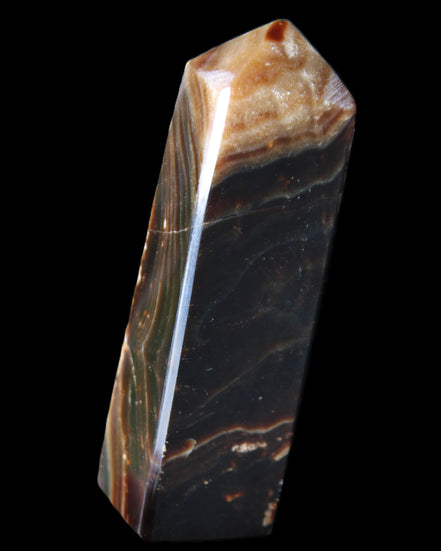 Chocolate Calcite obelisk 118*33*28mm 236g in sunlight - Rocks and Things Store