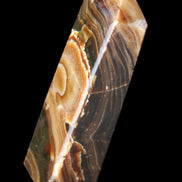 Chocolate Calcite obelisk 118*33*28mm 236g in sunlight - Rocks and Things Store