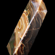 Chocolate Calcite obelisk 118*33*28mm 236g in sunlight - Rocks and Things Store