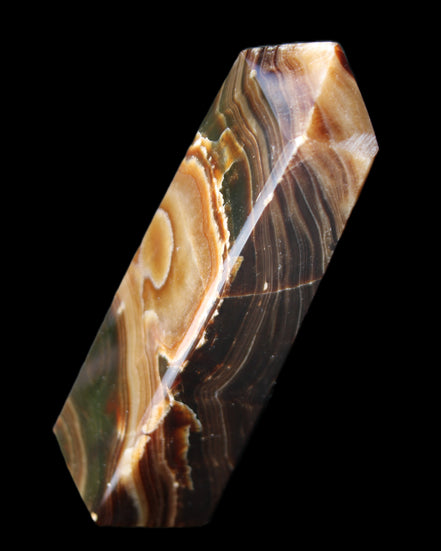 Chocolate Calcite obelisk 118*33*28mm 236g in sunlight - Rocks and Things Store