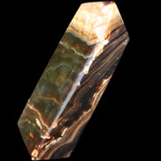 Chocolate Calcite obelisk 118*33*28mm 236g in sunlight - Rocks and Things Store