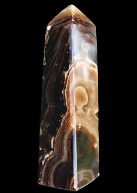 Chocolate Calcite obelisk 118*33*28mm 236g in sunlight - Rocks and Things Store