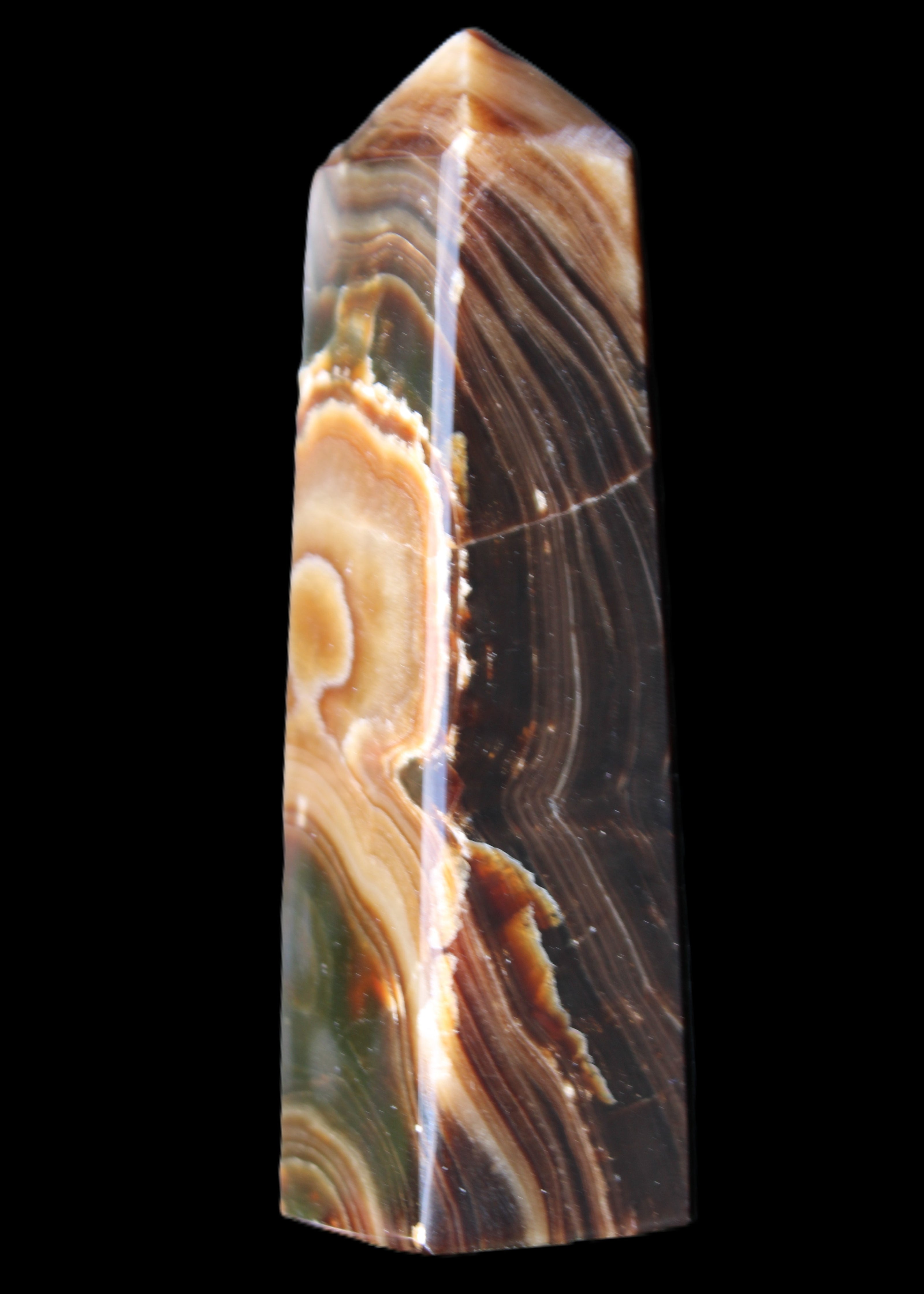 Chocolate Calcite obelisk 118*33*28mm 236g in sunlight - Rocks and Things Store