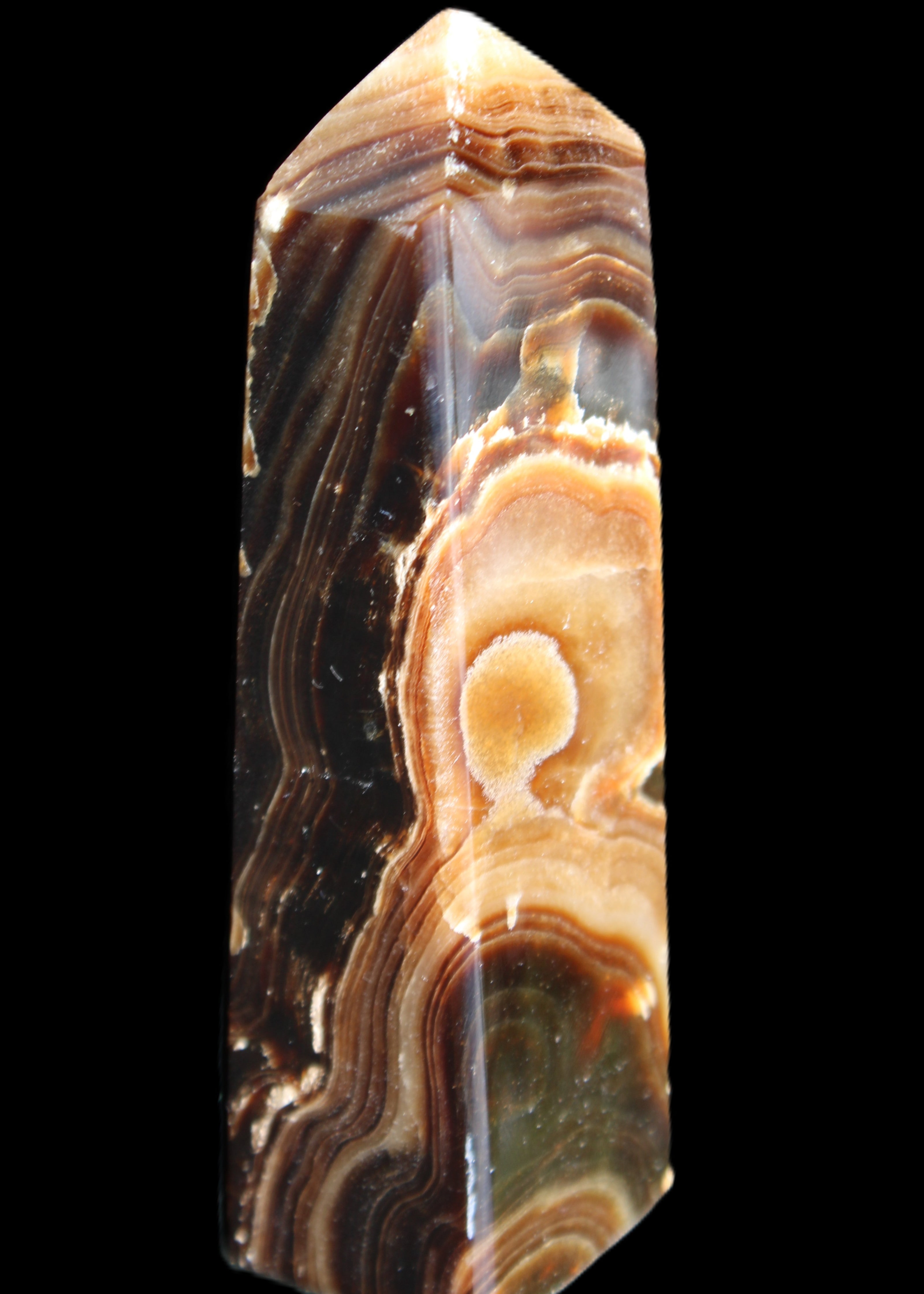 Chocolate Calcite obelisk 118*33*28mm 236g in sunlight - Rocks and Things Store