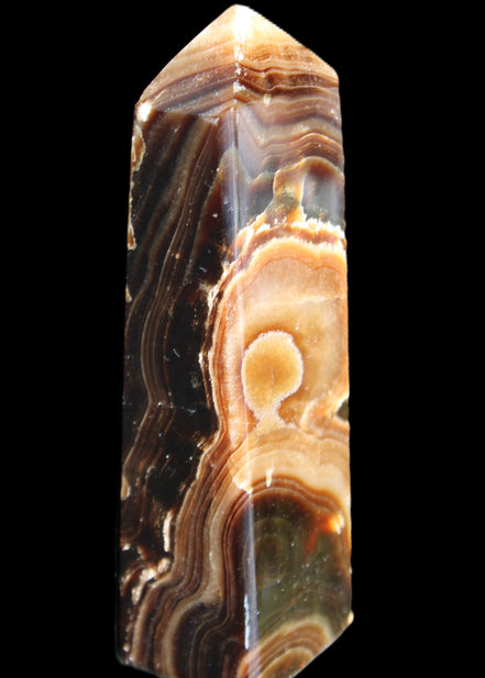 Chocolate Calcite obelisk 118*33*28mm 236g in sunlight - Rocks and Things Store