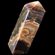 Chocolate Calcite obelisk 118*33*28mm 236g in sunlight - Rocks and Things Store