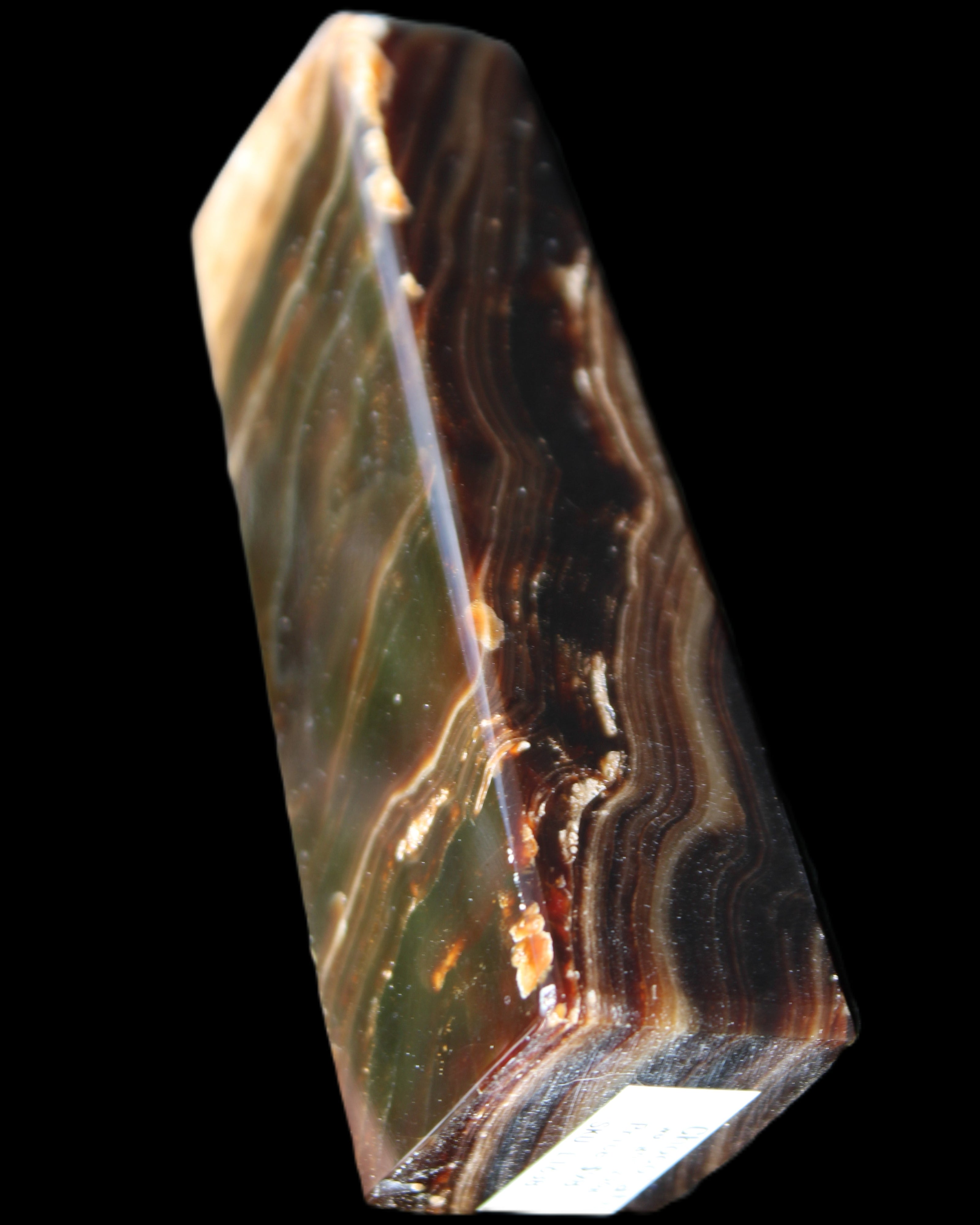 Chocolate Calcite obelisk 118*33*28mm 236g in sunlight - Rocks and Things Store