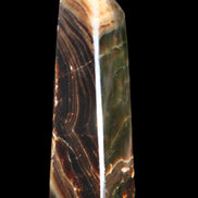 Chocolate Calcite obelisk 118*33*28mm 236g in sunlight - Rocks and Things Store