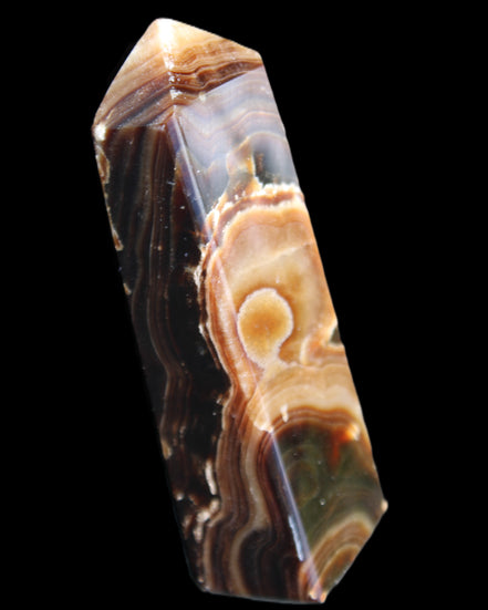 Chocolate Calcite obelisk 118*33*28mm 236g in sunlight - Rocks and Things Store