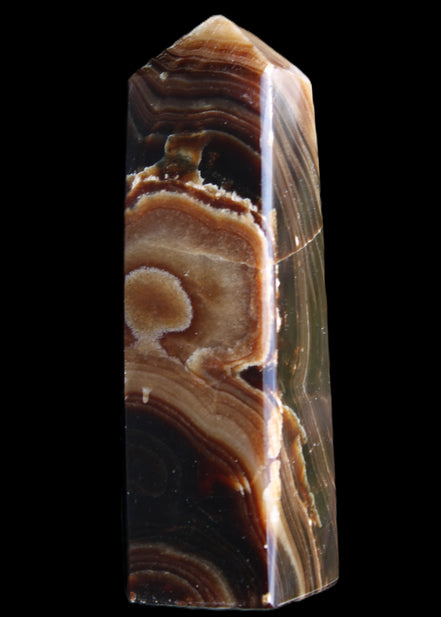 Chocolate Calcite obelisk 118*33*28mm 236g in sunlight - Rocks and Things Store