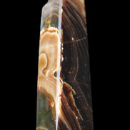 Chocolate Calcite obelisk 118*33*28mm 236g in sunlight - Rocks and Things Store