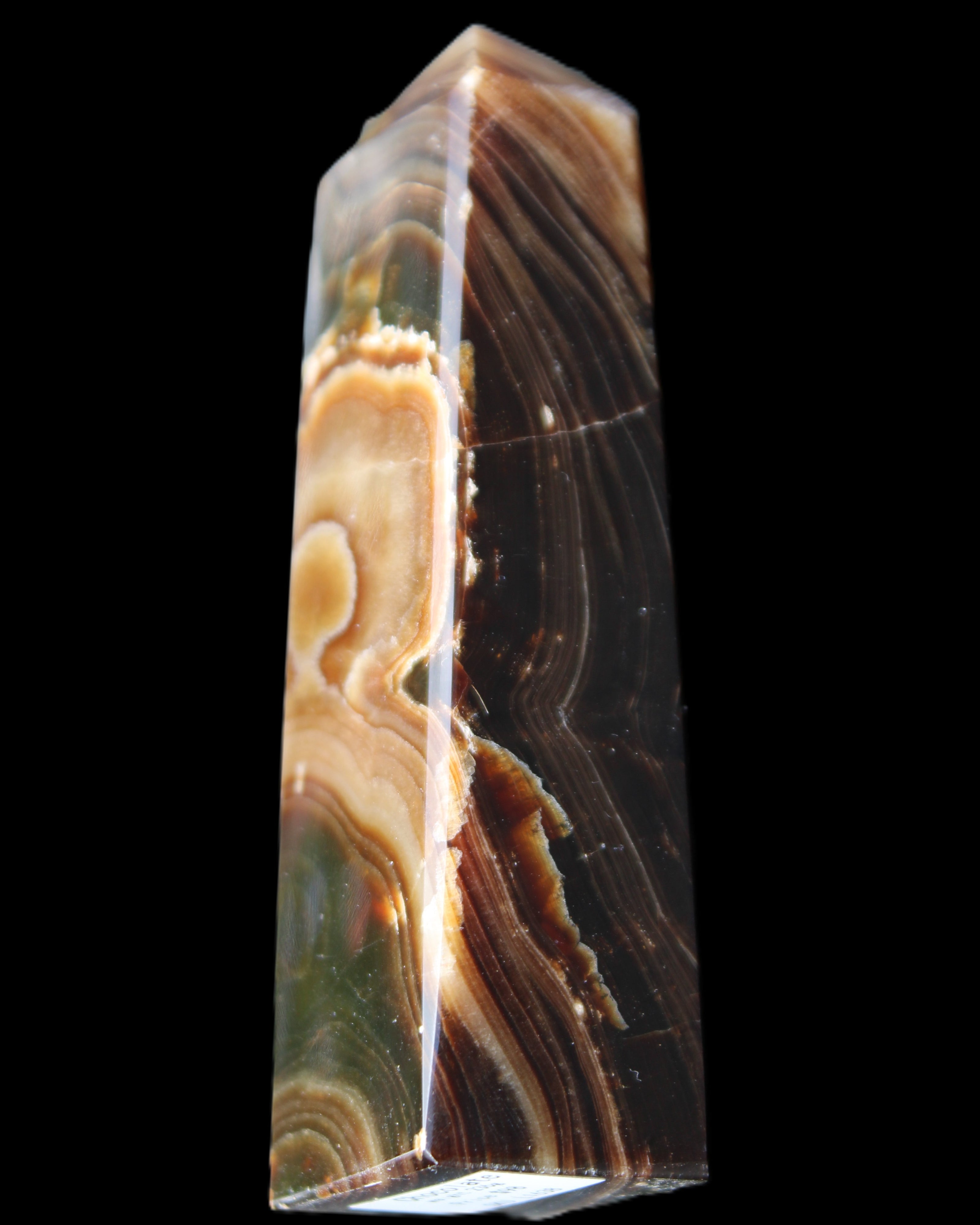 Chocolate Calcite obelisk 118*33*28mm 236g in sunlight - Rocks and Things Store