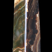 Chocolate Calcite obelisk 118*33*28mm 236g in sunlight - Rocks and Things Store