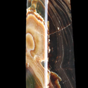 Chocolate Calcite obelisk 118*33*28mm 236g in sunlight - Rocks and Things Store