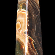 Chocolate Calcite obelisk 118*33*28mm 236g in sunlight - Rocks and Things Store