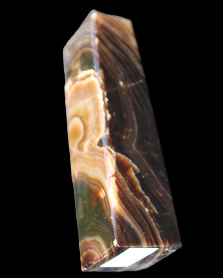 Chocolate Calcite obelisk 118*33*28mm 236g in sunlight - Rocks and Things Store
