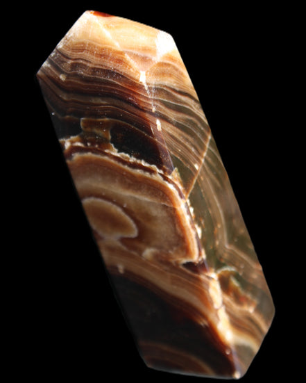 Chocolate Calcite obelisk 118*33*28mm 236g in sunlight - Rocks and Things Store