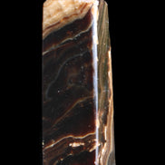 Chocolate Calcite obelisk 118*33*28mm 236g in sunlight - Rocks and Things Store