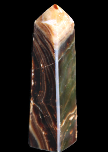 Chocolate Calcite obelisk 118*33*28mm 236g in sunlight - Rocks and Things Store