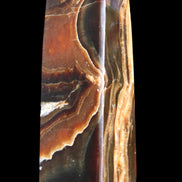 Chocolate Calcite obelisk 107*33*32mm 236g in sunlight - Rocks and Things Store