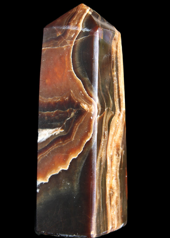 Chocolate Calcite obelisk 107*33*32mm 236g in sunlight - Rocks and Things Store
