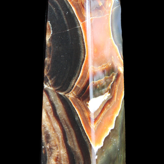 Chocolate Calcite obelisk 107*33*32mm 236g in sunlight - Rocks and Things Store