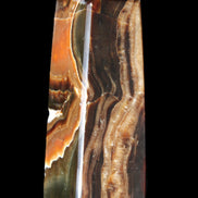 Chocolate Calcite obelisk 107*33*32mm 236g in sunlight - Rocks and Things Store