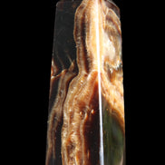 Chocolate Calcite obelisk 107*33*32mm 236g in sunlight - Rocks and Things Store