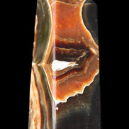 Chocolate Calcite obelisk 107*33*32mm 236g in sunlight - Rocks and Things Store