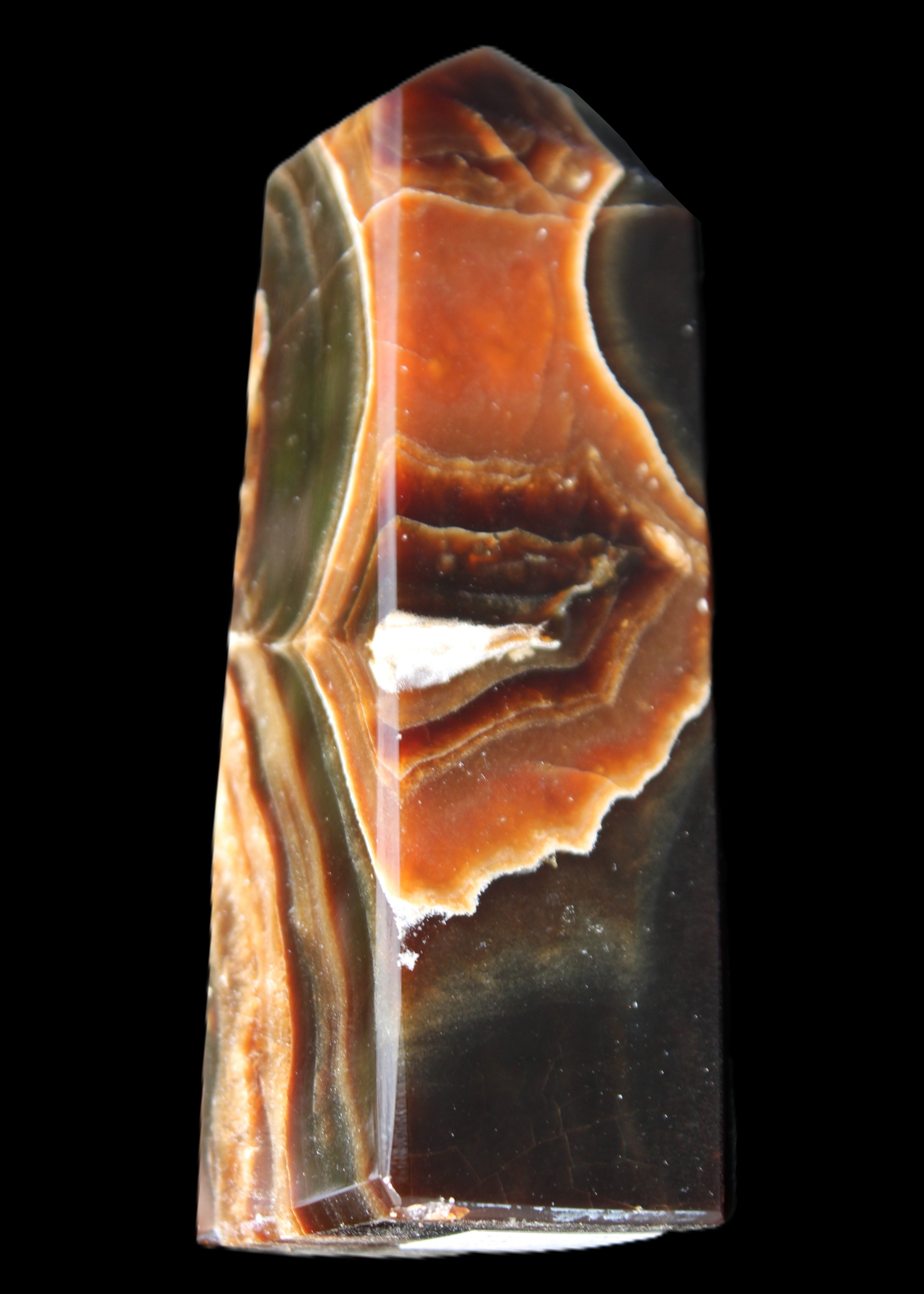 Chocolate Calcite obelisk 107*33*32mm 236g in sunlight - Rocks and Things Store