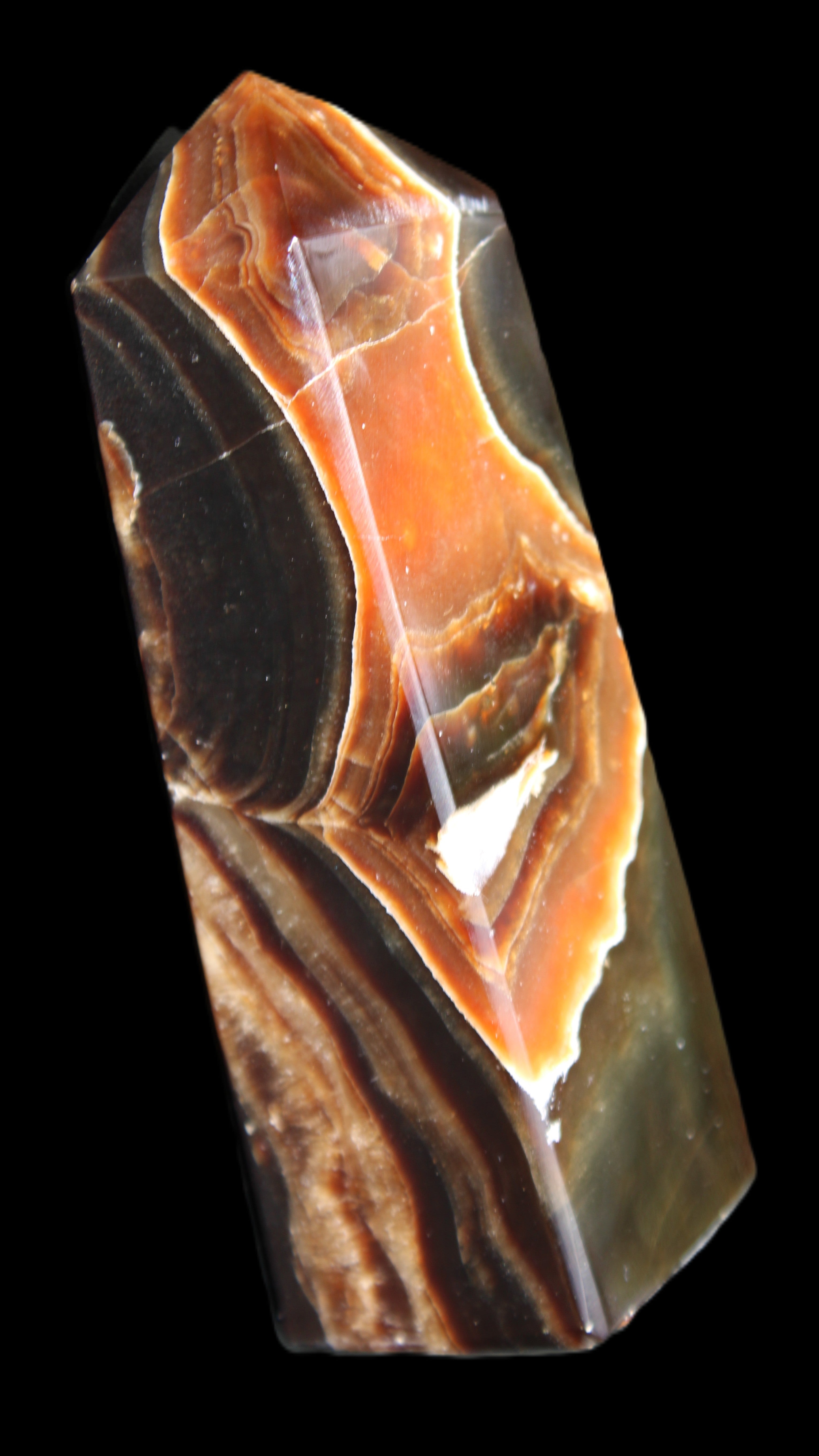 Chocolate Calcite obelisk 107*33*32mm 236g in sunlight - Rocks and Things Store