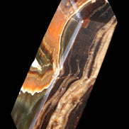 Chocolate Calcite obelisk 107*33*32mm 236g in sunlight - Rocks and Things Store