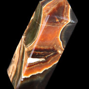 Chocolate Calcite obelisk 107*33*32mm 236g in sunlight - Rocks and Things Store