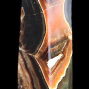 Chocolate Calcite obelisk 107*33*32mm 236g in sunlight - Rocks and Things Store