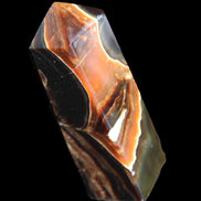 Chocolate Calcite obelisk 107*33*32mm 236g in sunlight - Rocks and Things Store