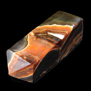 Chocolate Calcite obelisk 107*33*32mm 236g in sunlight - Rocks and Things Store