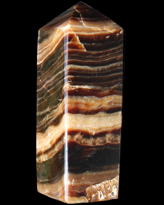 Chocolate Calcite obelisk 98*32*30mm 253g in sunlight - Rocks and Things Store