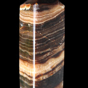 Chocolate Calcite obelisk 98*32*30mm 253g in sunlight - Rocks and Things Store