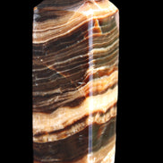 Chocolate Calcite obelisk 98*32*30mm 253g in sunlight - Rocks and Things Store